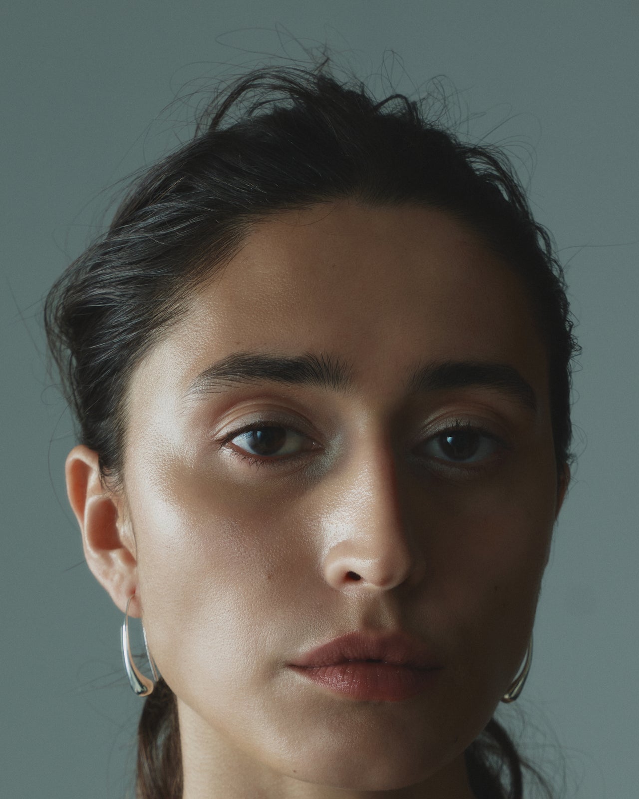 Tilt Elongated Hoops in Silver